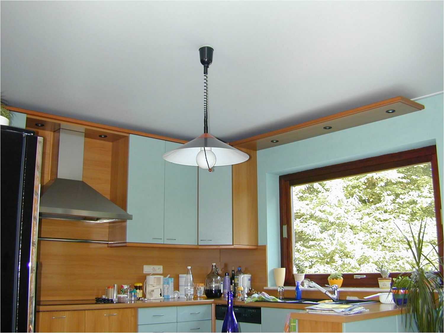 Натяжной потолок на кухне: одноуровневые и с рисунком, глянцевый и матовый, какой вид лучше