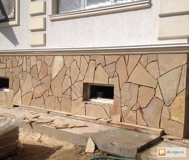 Использование песчаника для отделки фасада дома